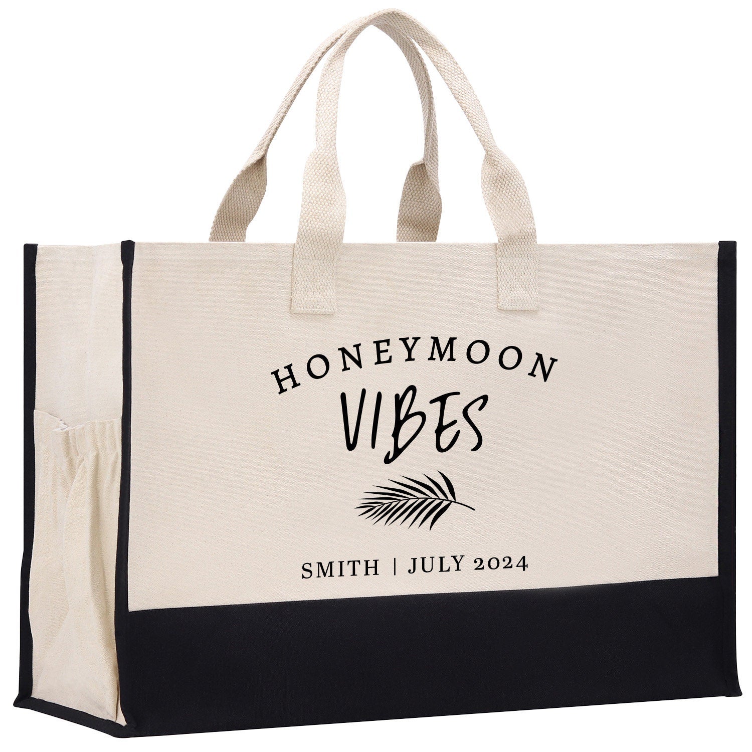 a black and white shopping bag with the words honeymoon vibes printed on it