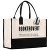 a black and white book tote bag on a white background