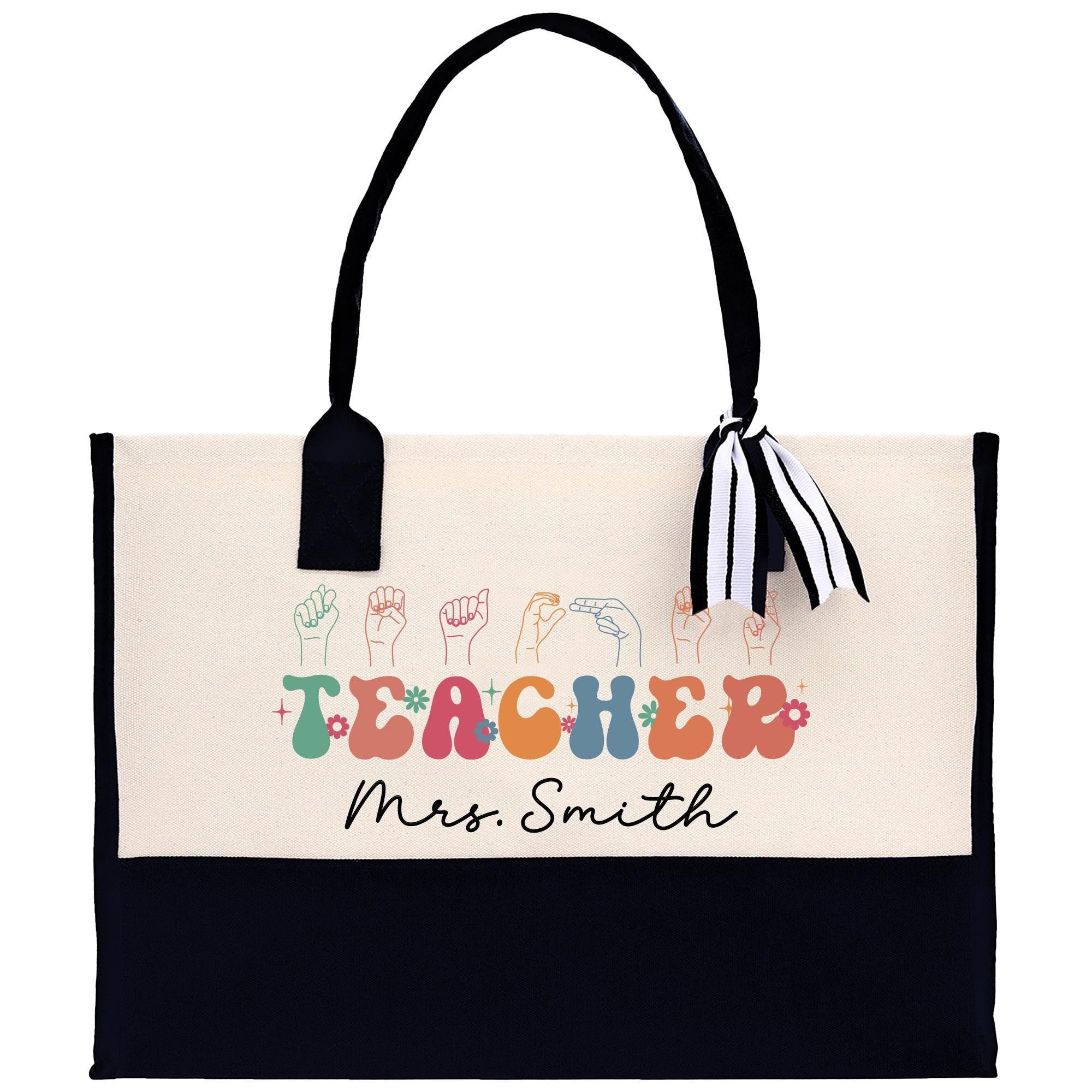 a black and white bag with a teacher&#39;s name on it