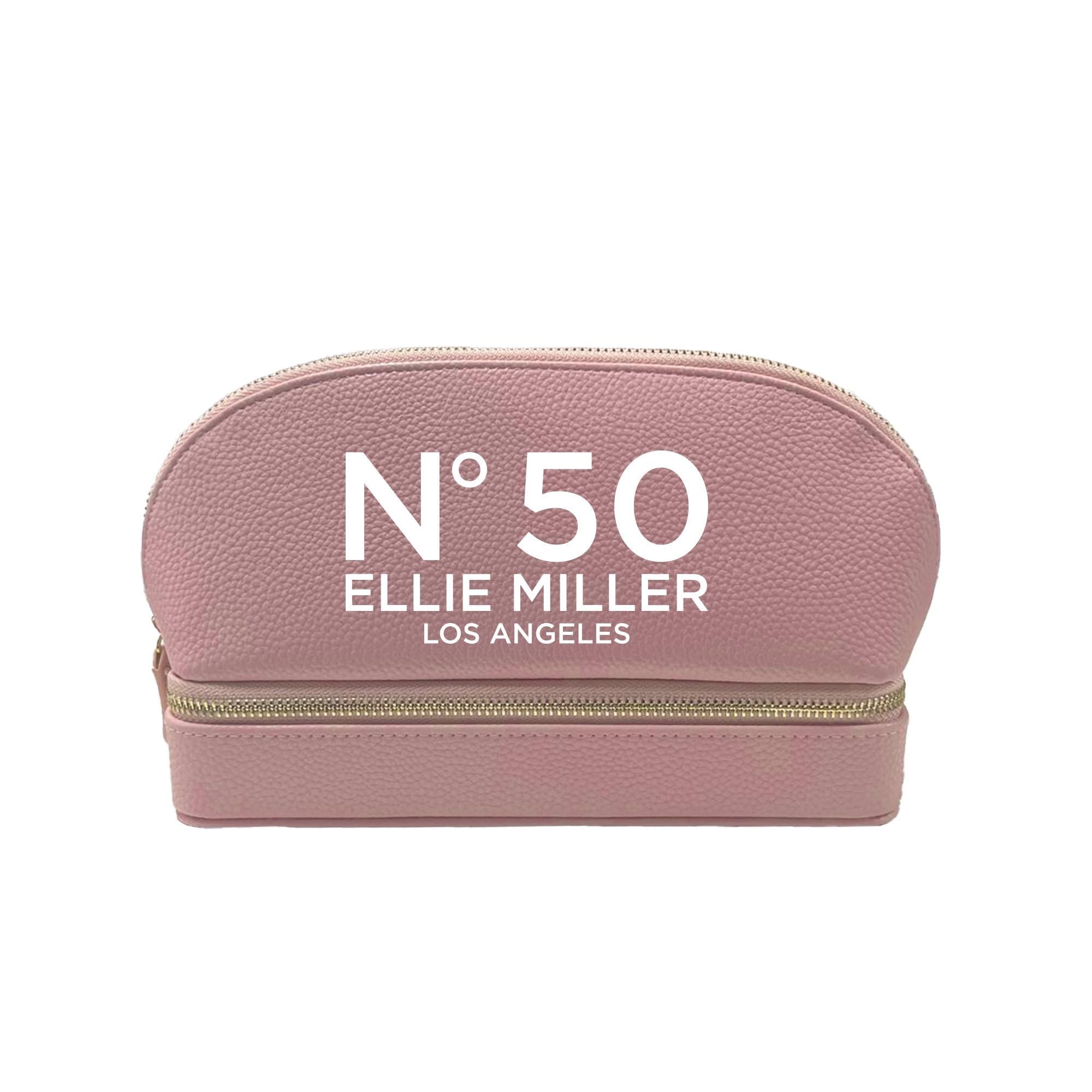 a pink cosmetic bag with the number 50 on it