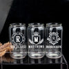 three glass jars with monogrammed labels on them