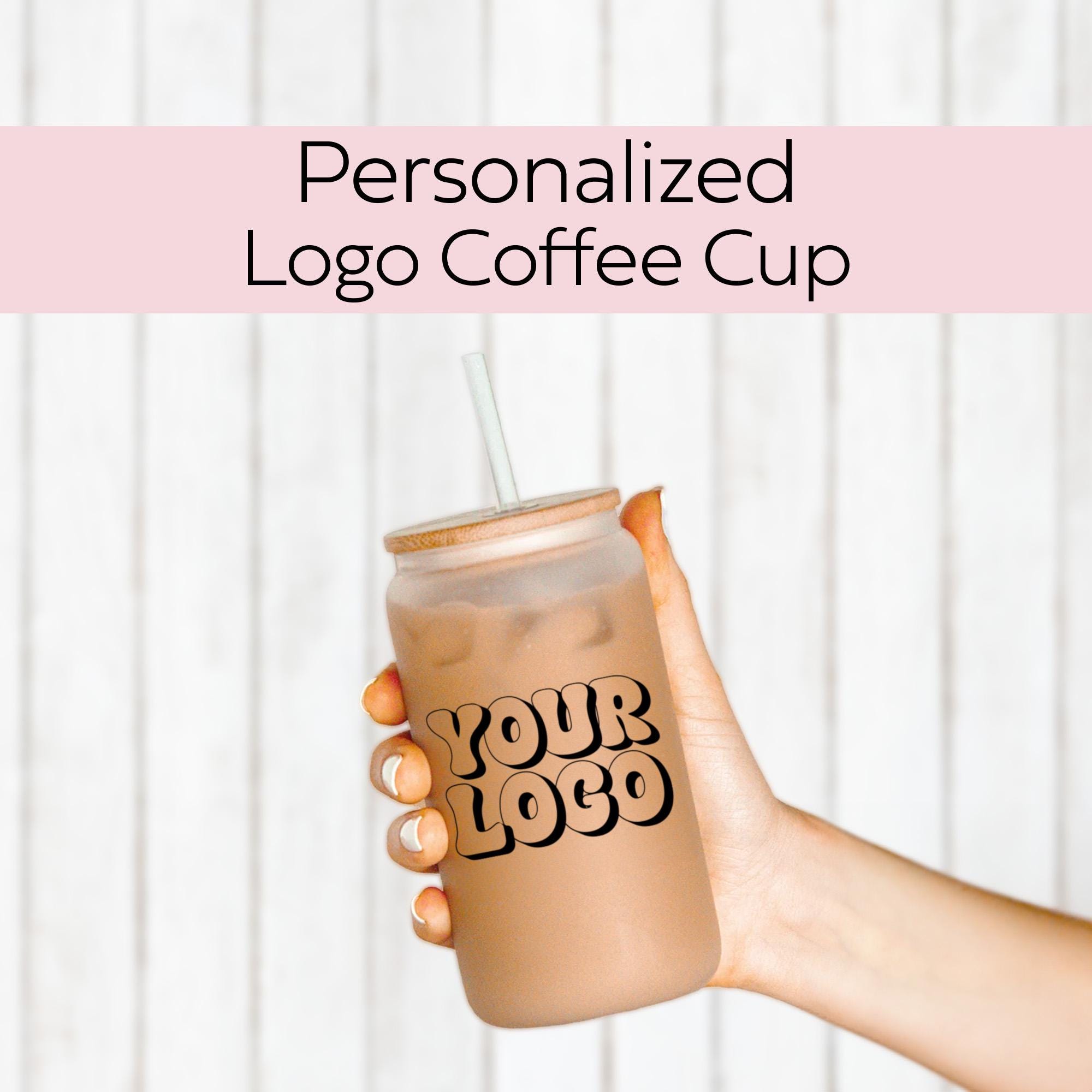 a person holding a coffee cup with the words personalized logo on it