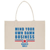 a shopping bag with the words mind your own damn business