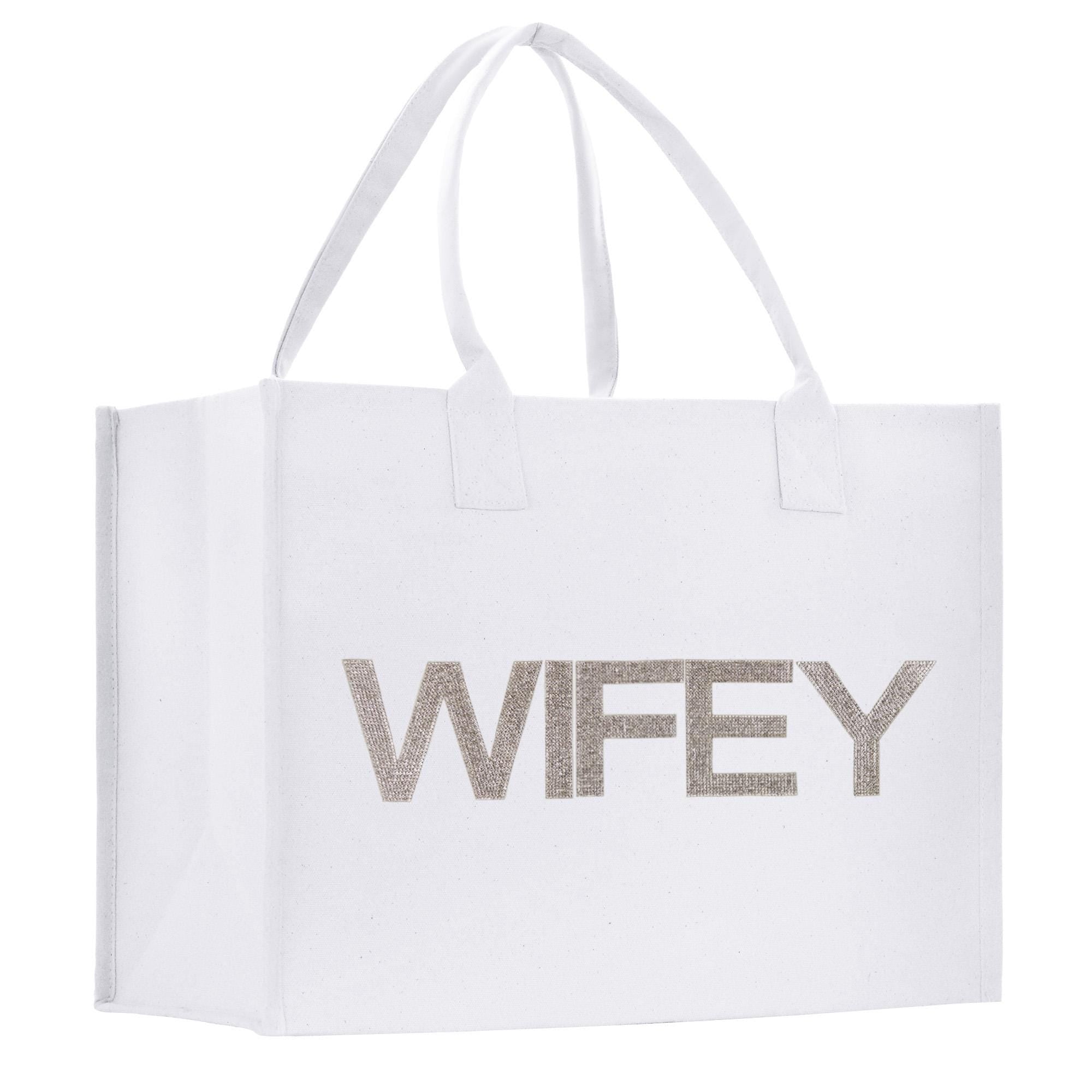 a white shopping bag with the word wife printed on it