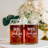 a couple of jars sitting on top of a table