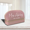 a pink makeup bag with the name mrs ashley on it