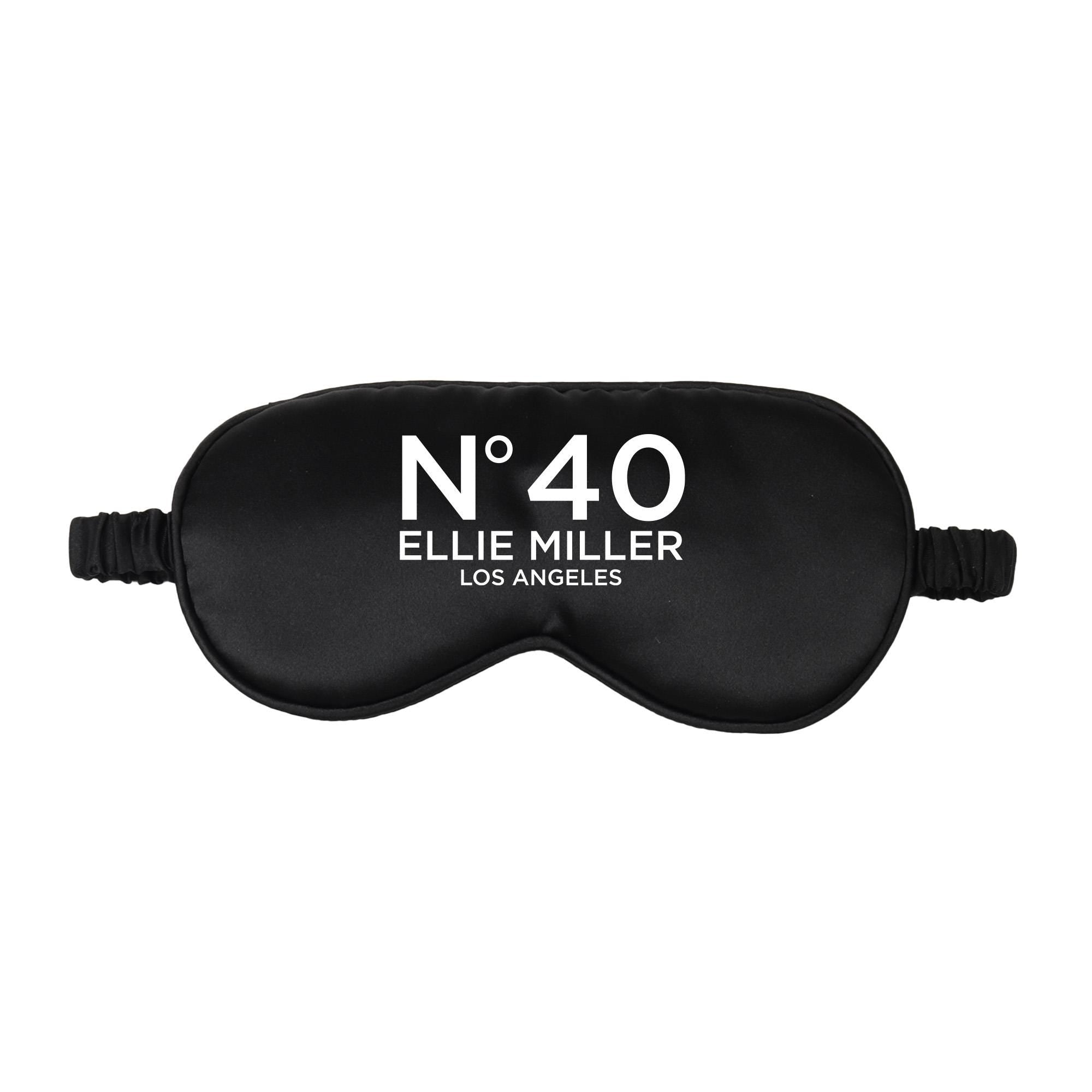 a black sleep mask with the number forty on it