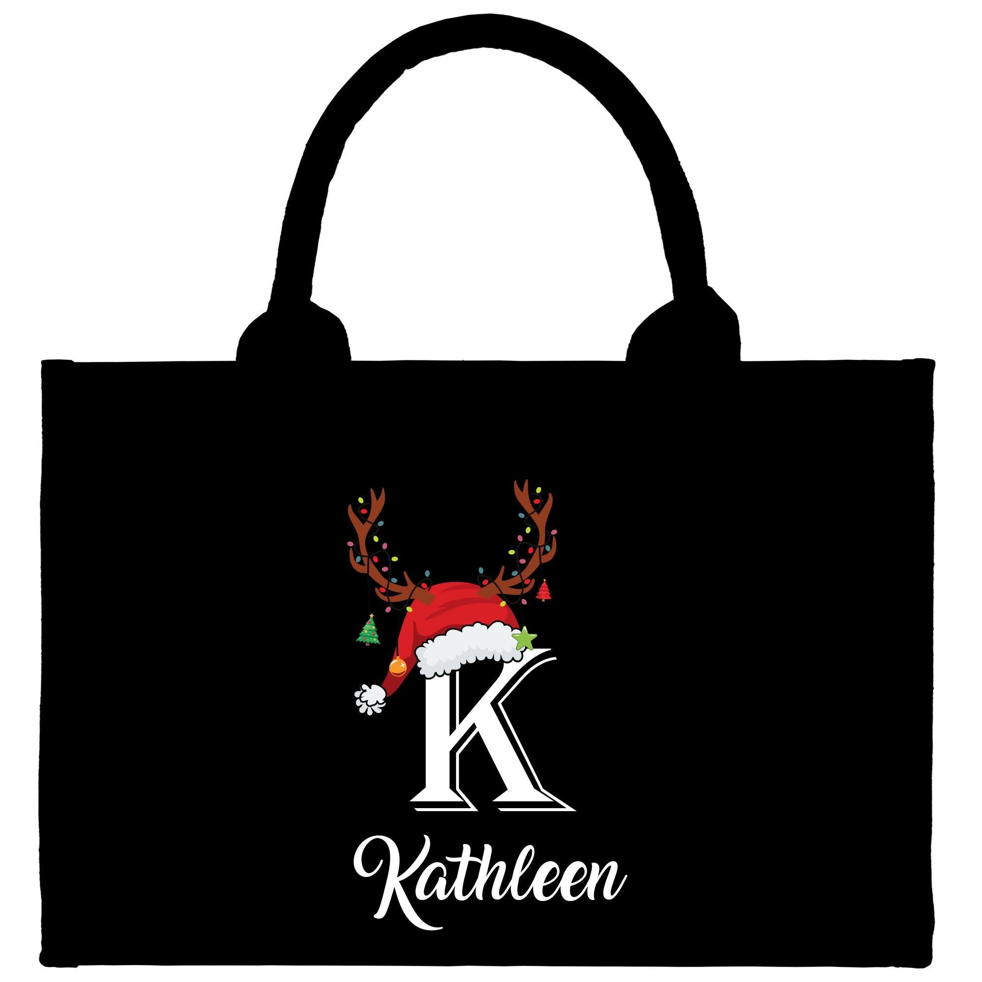 a black bag with reindeer antlers and a k on it