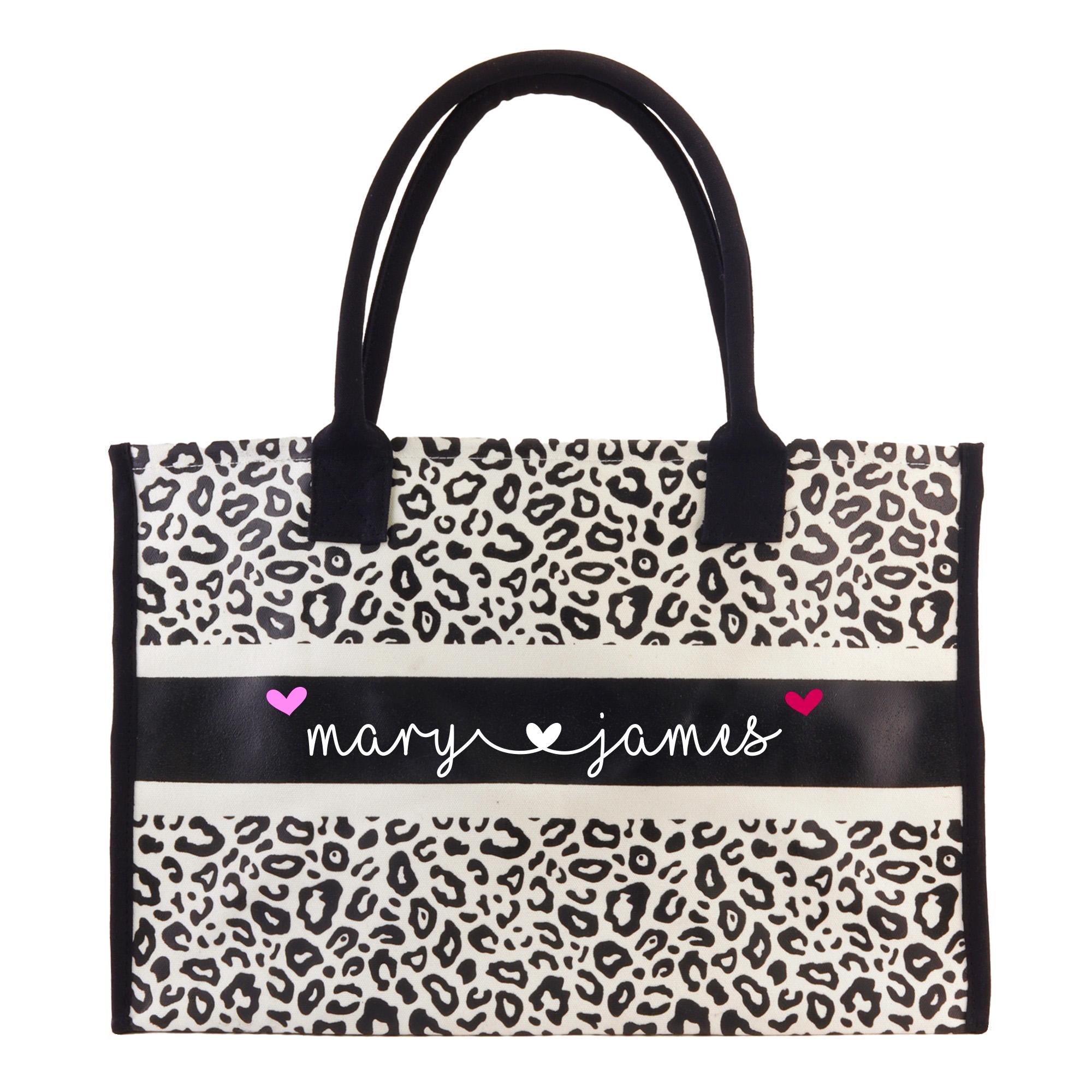 a leopard print bag with a name on it