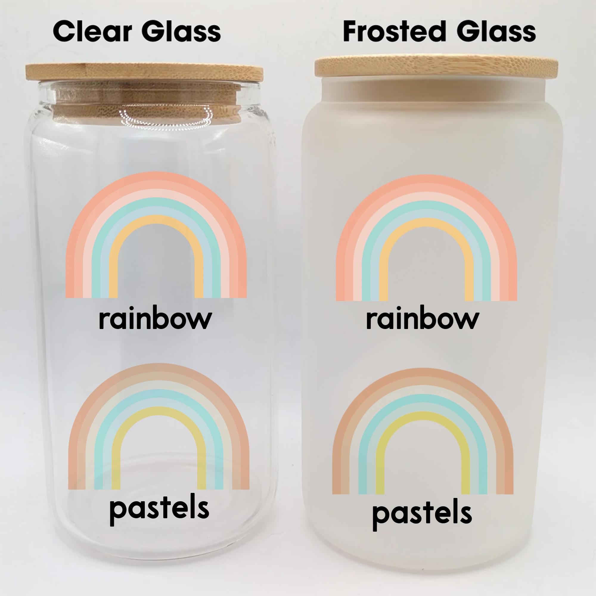 two clear jars with rainbow labels on them