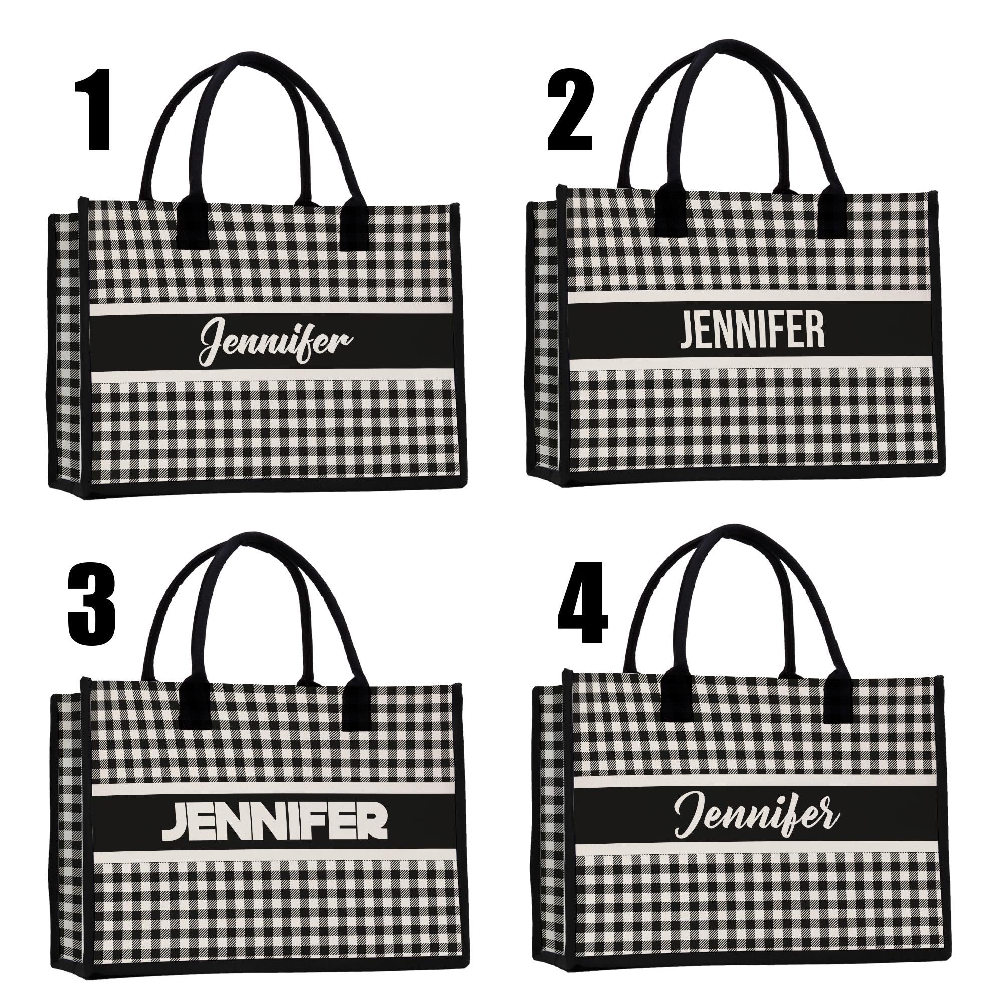 a set of four black and white gingham shopping bags