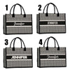 a set of four black and white gingham shopping bags