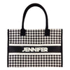 a black and white gingham bag with a name on it