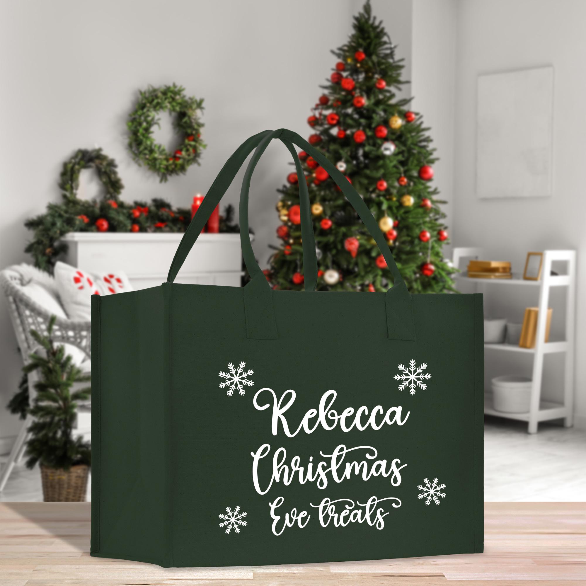 a christmas shopping bag sitting on top of a wooden table