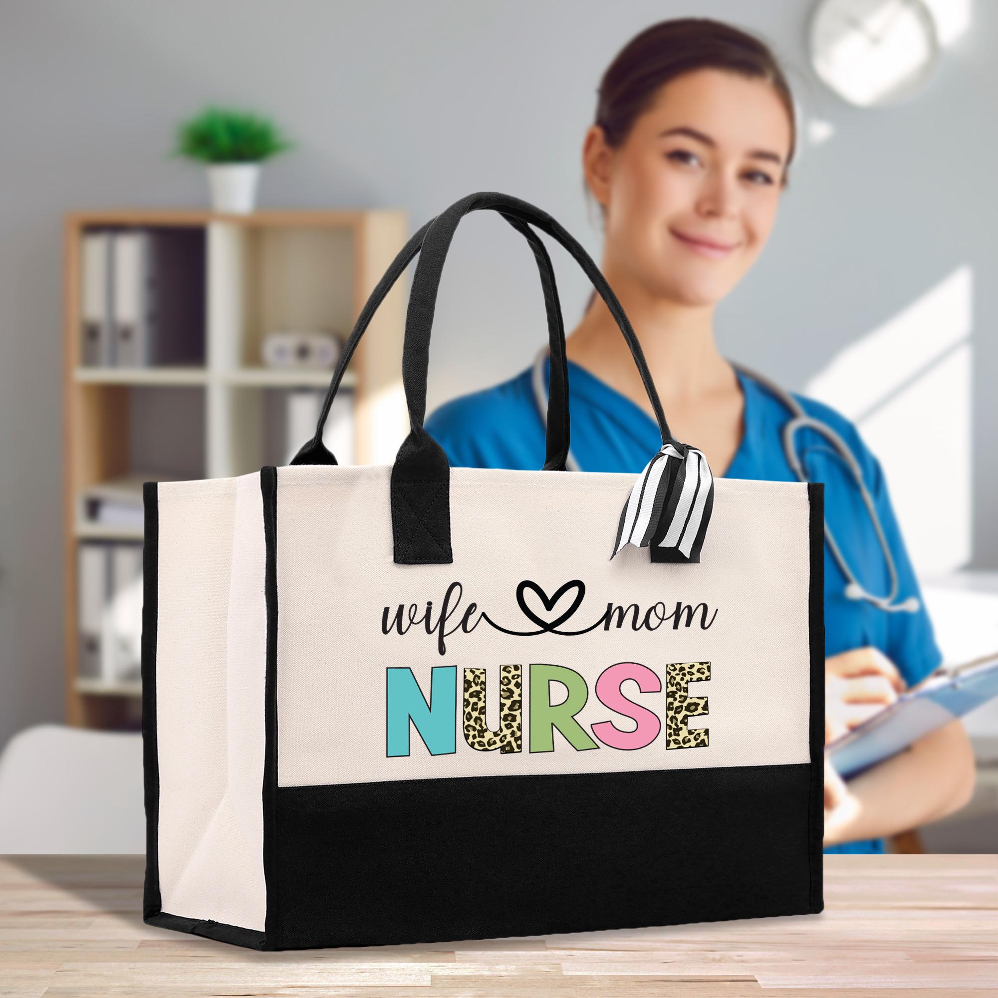 a woman in a blue shirt holding a black and white nurse bag