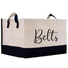 a white and black bag with the word belts on it