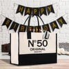 a black and white bag with a happy birthday sign on it