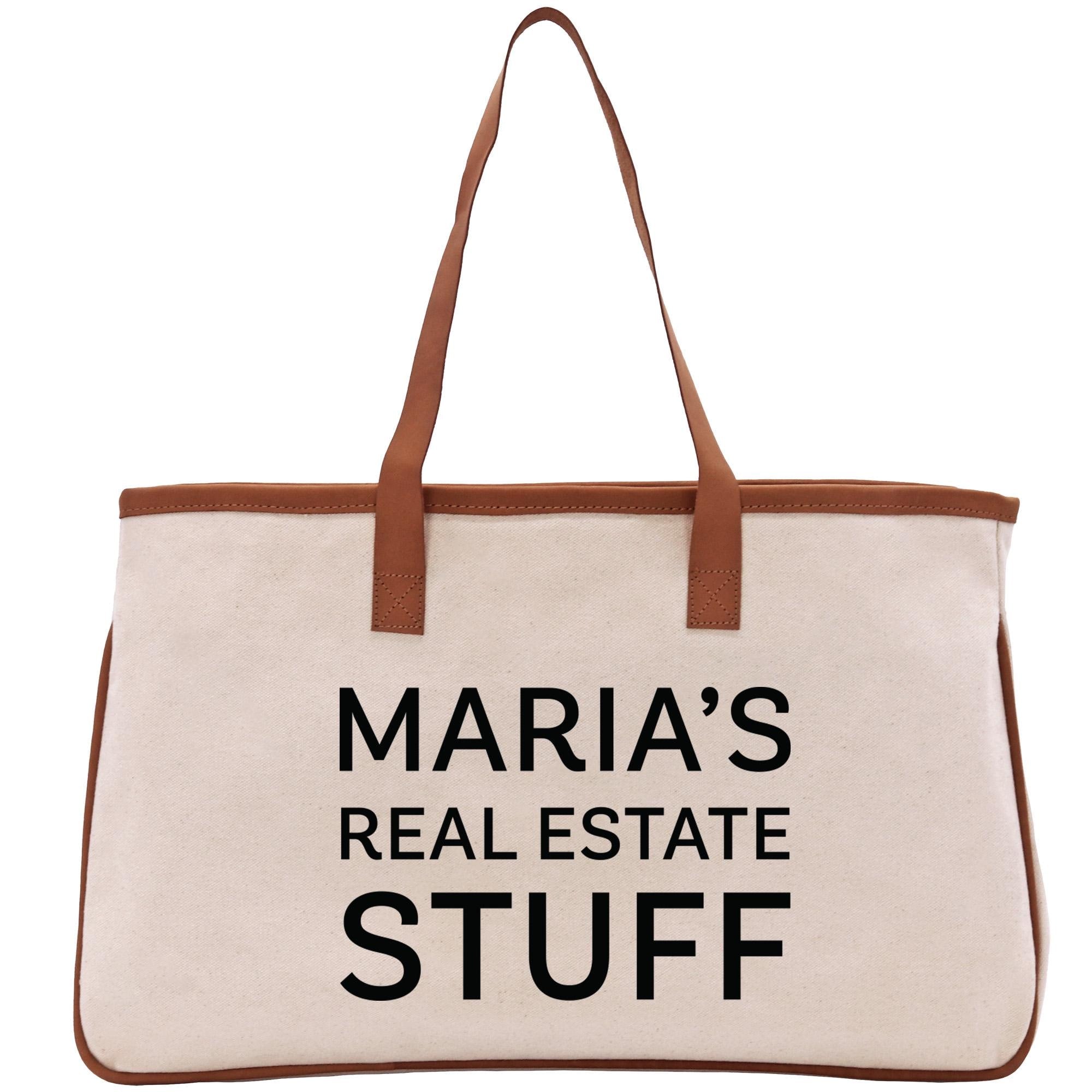 a white bag with a brown handle that says maria&#39;s real estate stuff