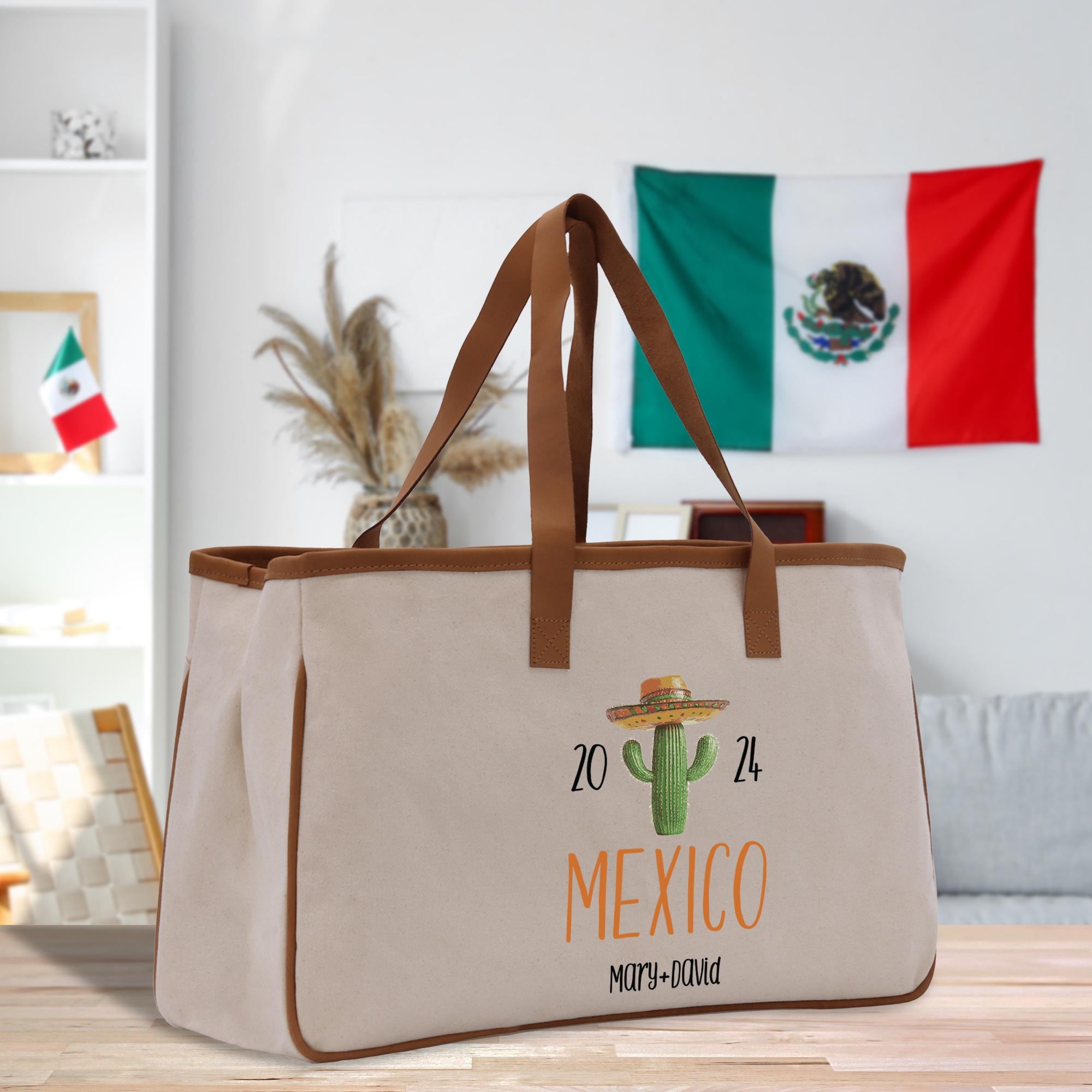 a canvas tote bag with a cactus on it