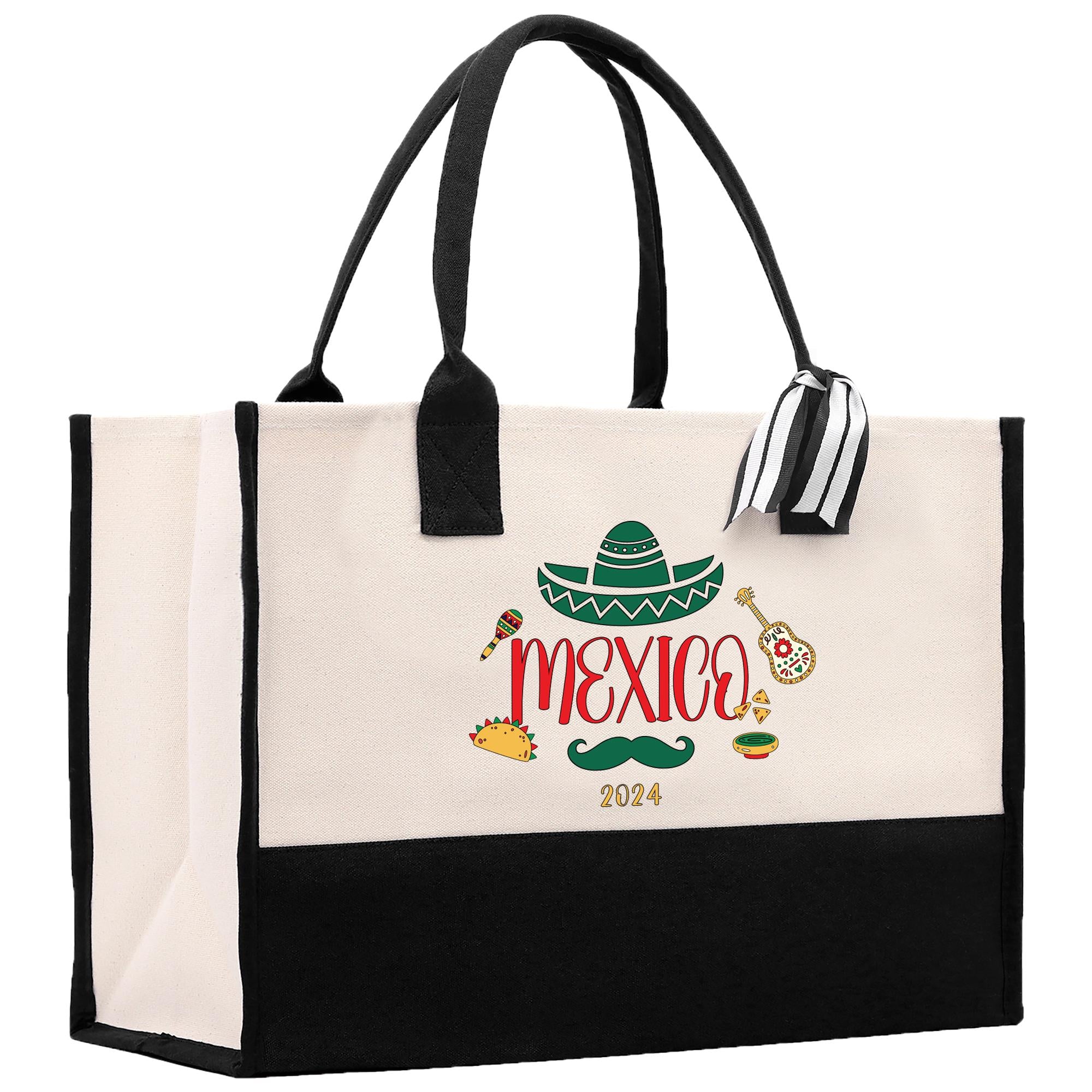 a black and white tote bag with a mexican design