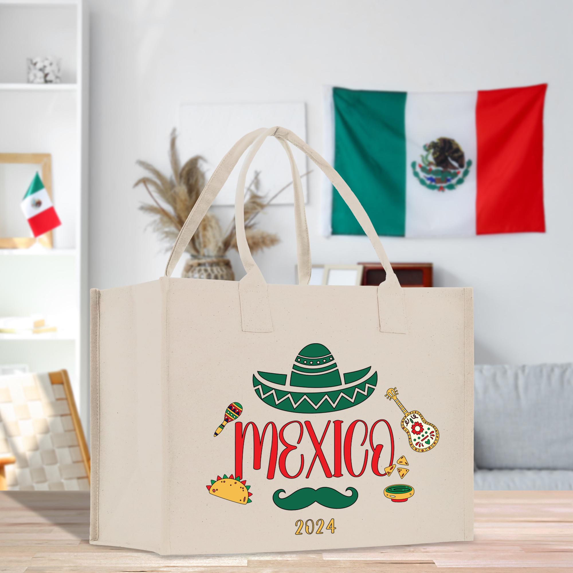 a white bag with a mexican design on it