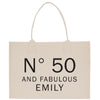 a white bag with the words n'50 and fabulous family printed on it