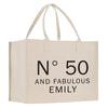 a white shopping bag with the words n'50 and fabulous family printed on it