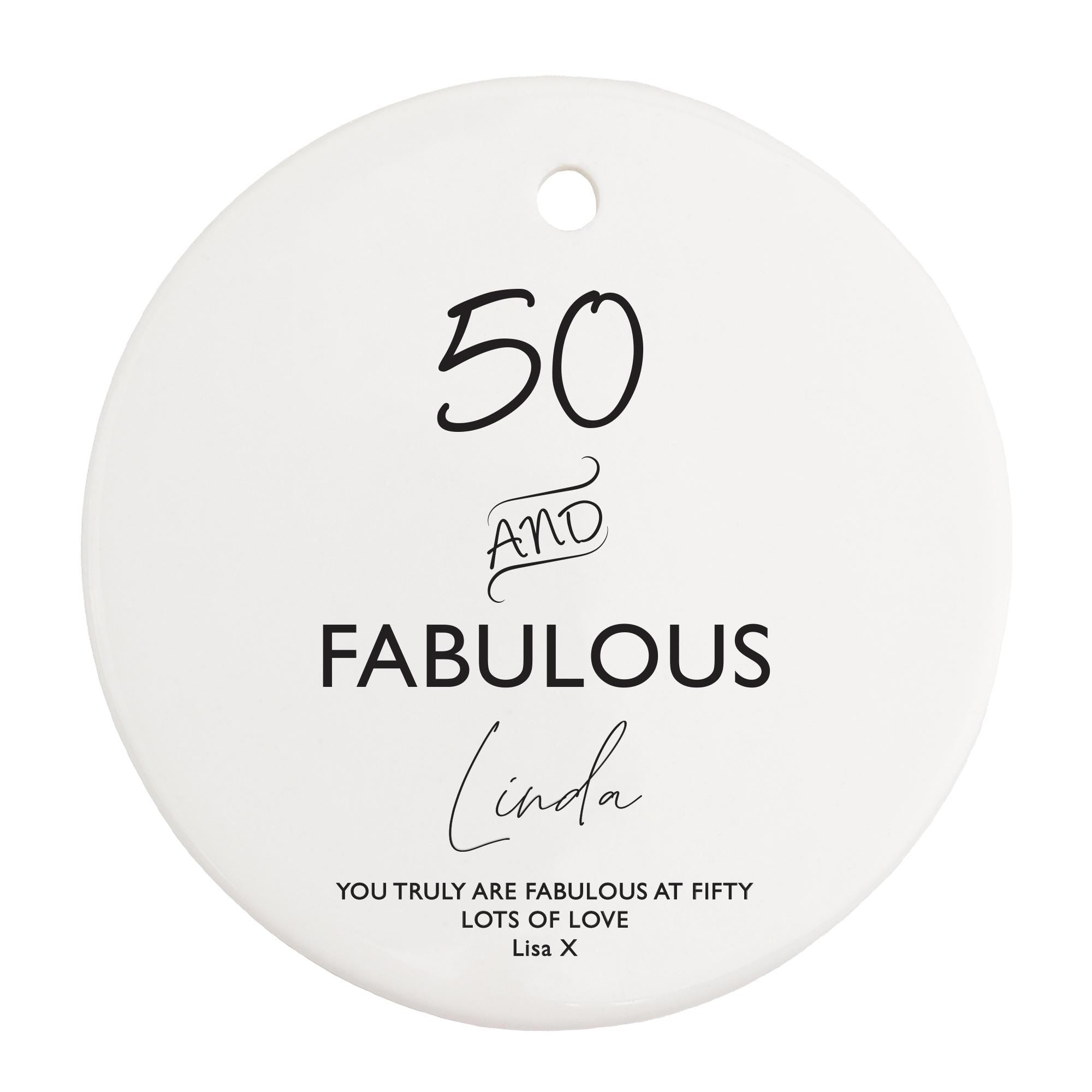 a white ornament with the words fabulous and fabulous written on it