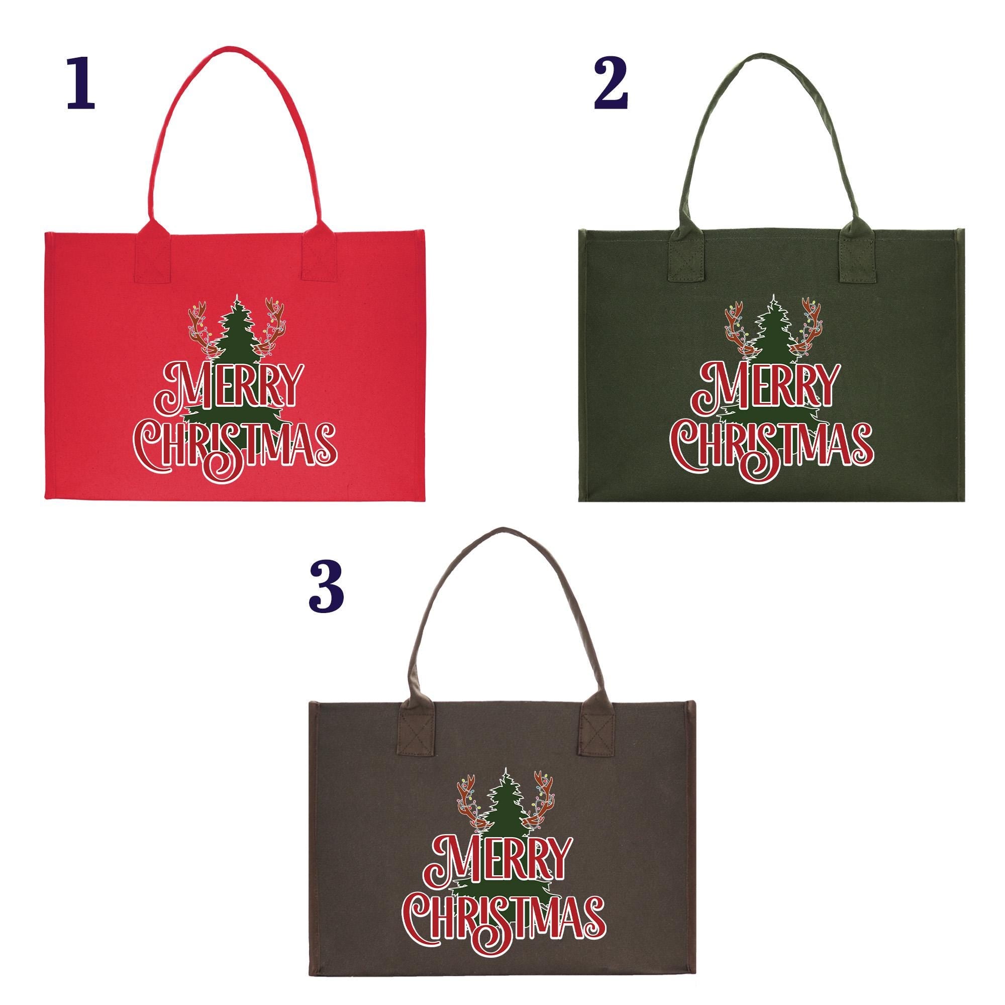 four christmas shopping bags with the words merry christmas on them