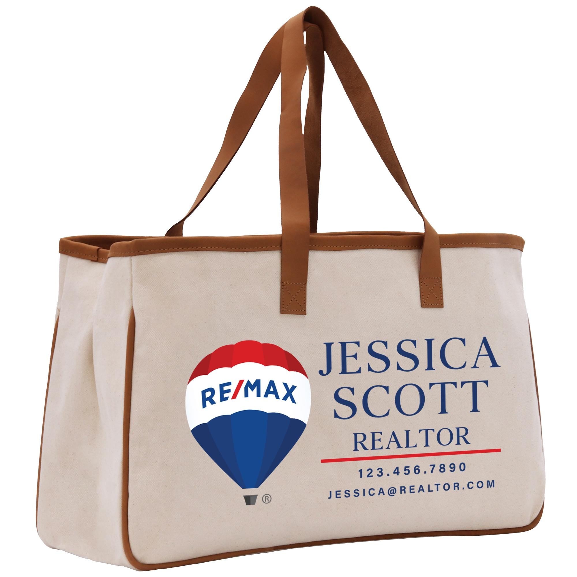 a re / max tote bag with a re / max hot air balloon on