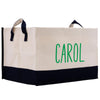 a white and black bag with a green word on it