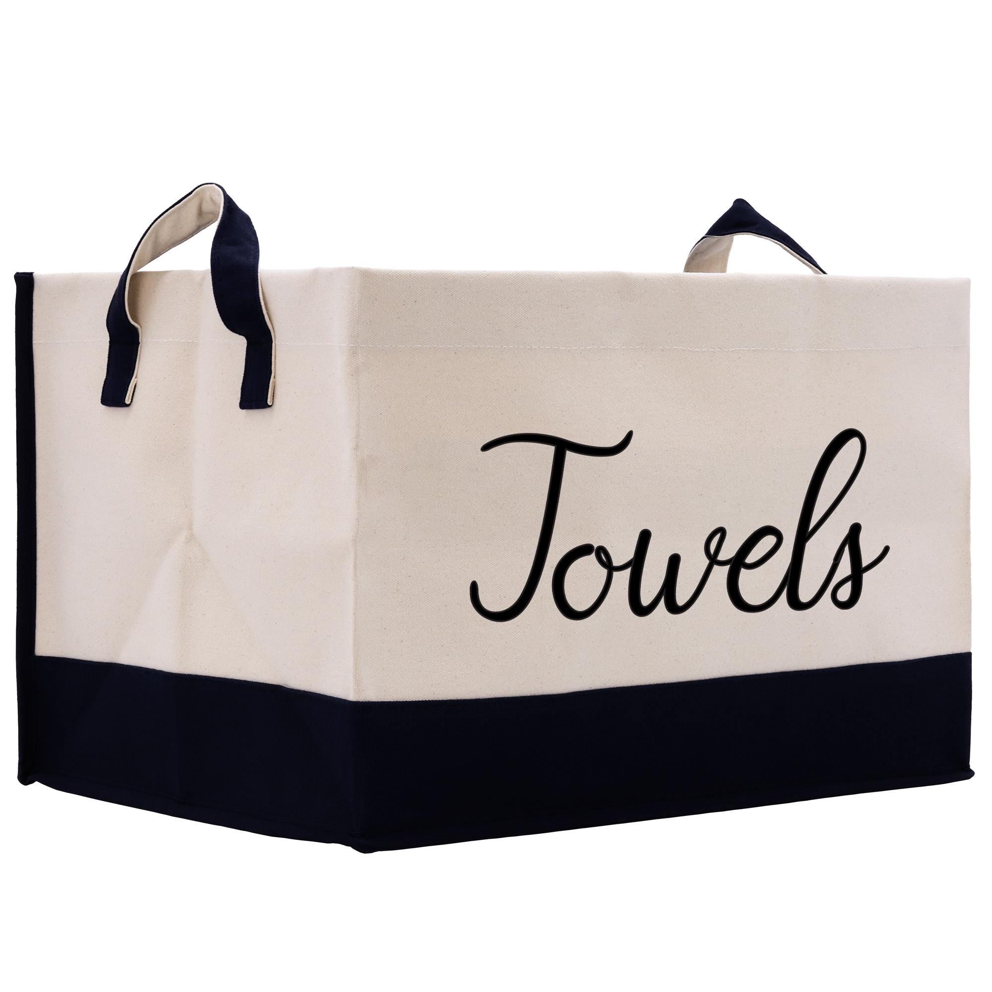 a white and black bag with the words towels on it