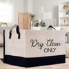 a black and white bag that says dry clean only