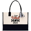 a black and white bag with a football mom on it