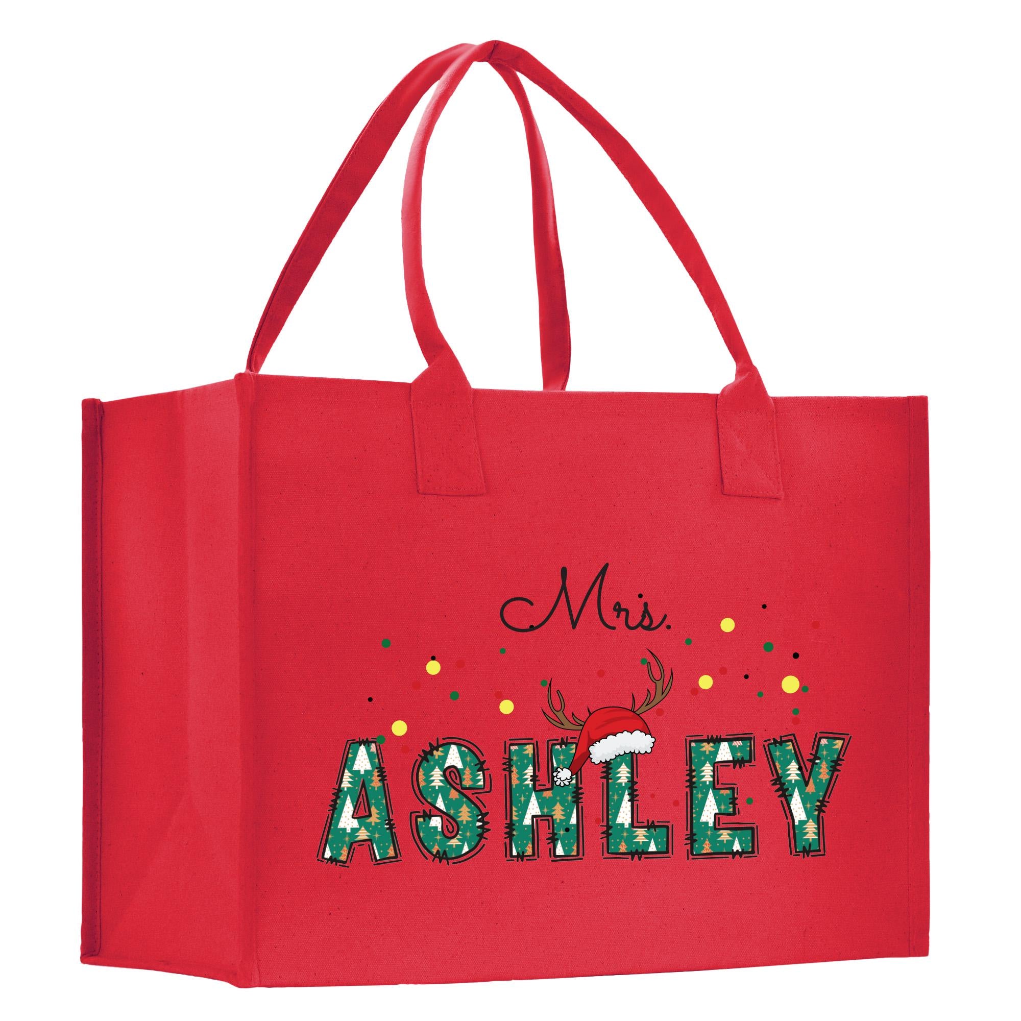 a red shopping bag with the word ashley printed on it