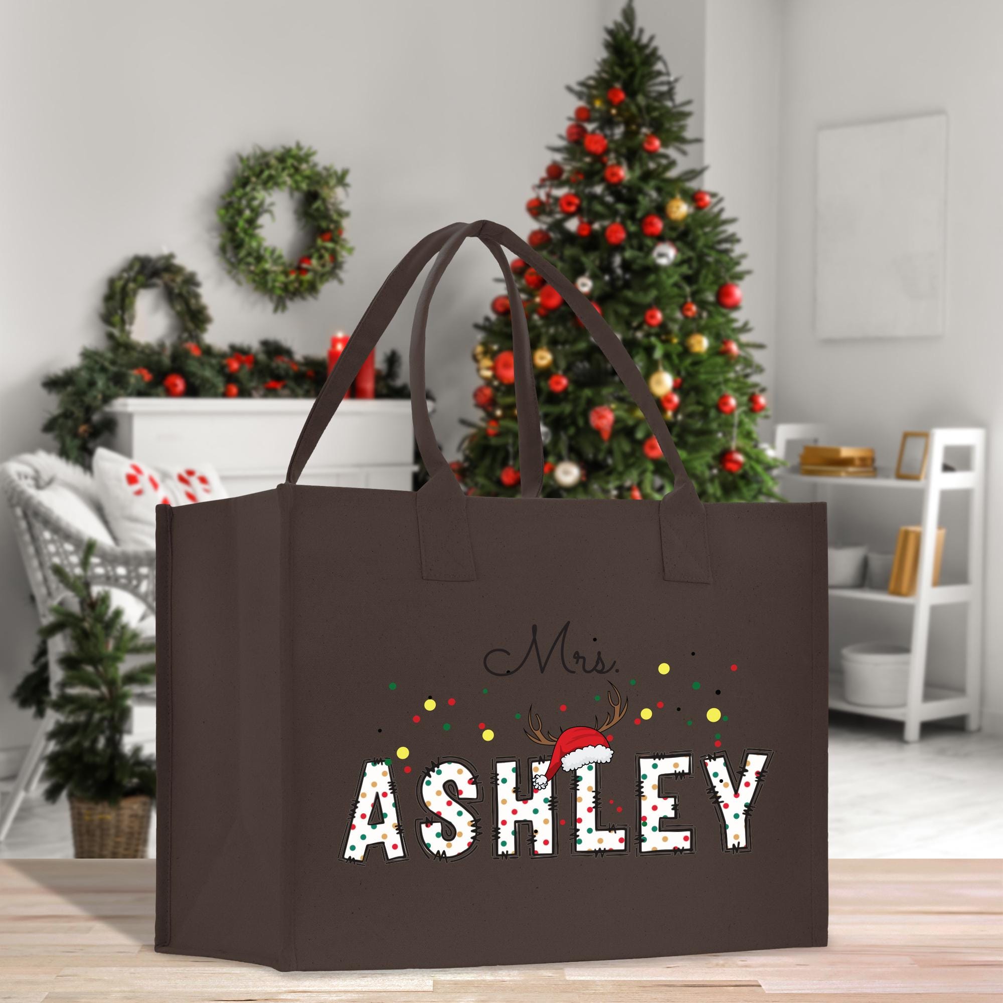 a brown shopping bag with the word ashley on it