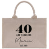 a white shopping bag with the number forty and fabulous marina est 1911 printed on it