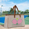 a bag sitting on a table with a tennis court in the background