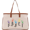 a canvas bag with hand prints on it