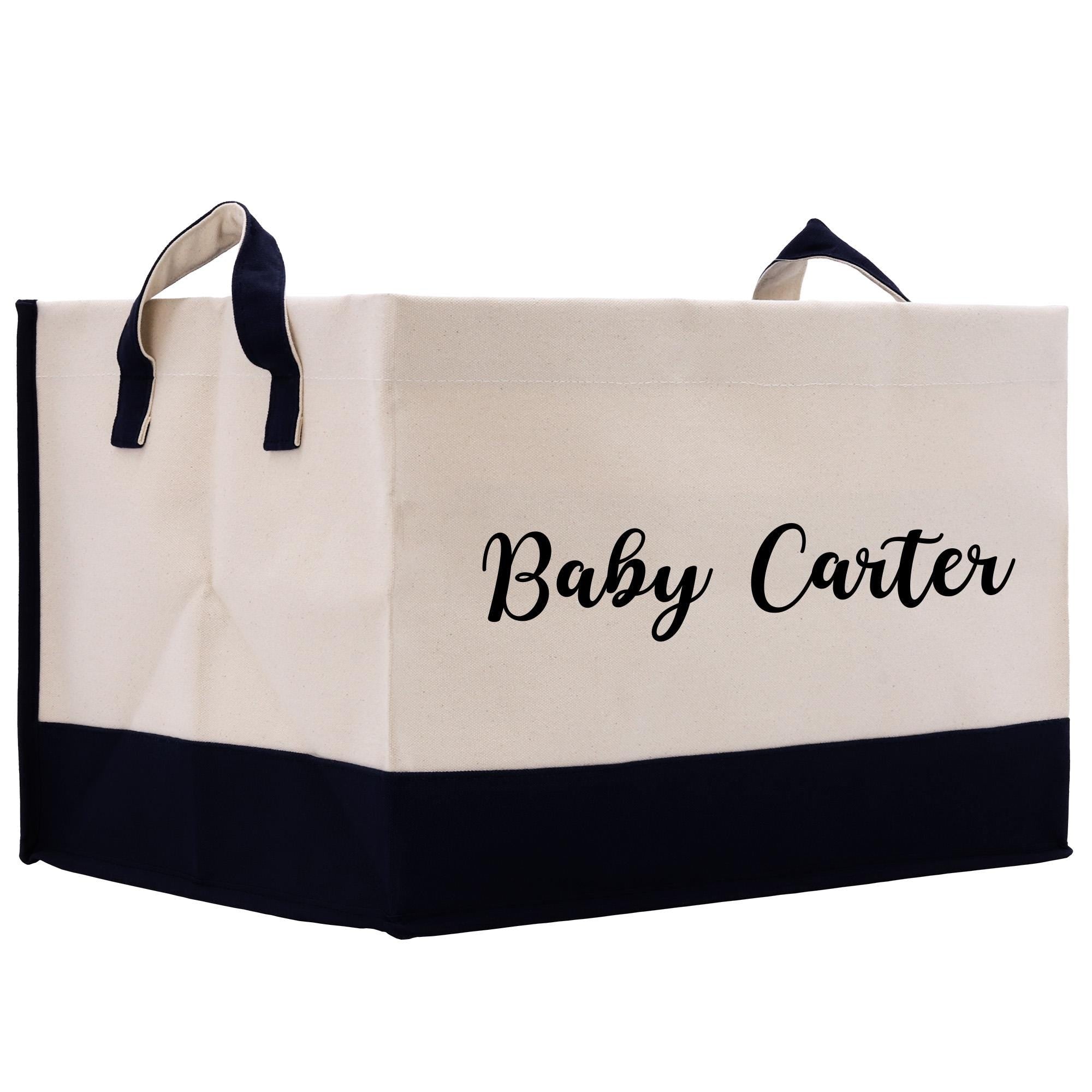 a white and black shopping bag with the word baby carrier printed on it