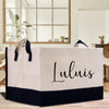 a white and black shopping bag sitting on top of a wooden table