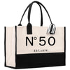 a black and white shopping bag with the number 50 on it