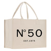 a white shopping bag with the number 50 printed on it