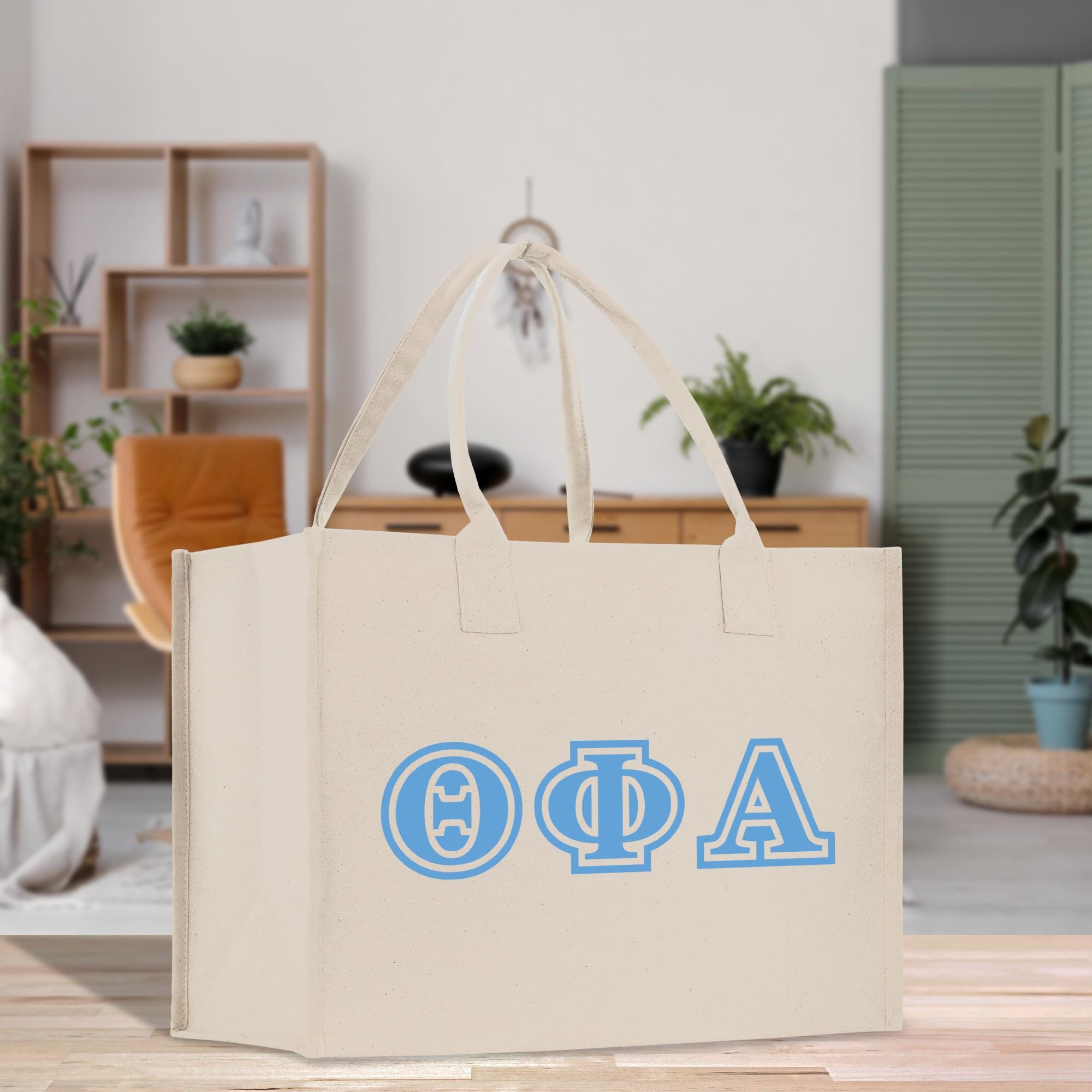 a white bag with a blue greek letter on it