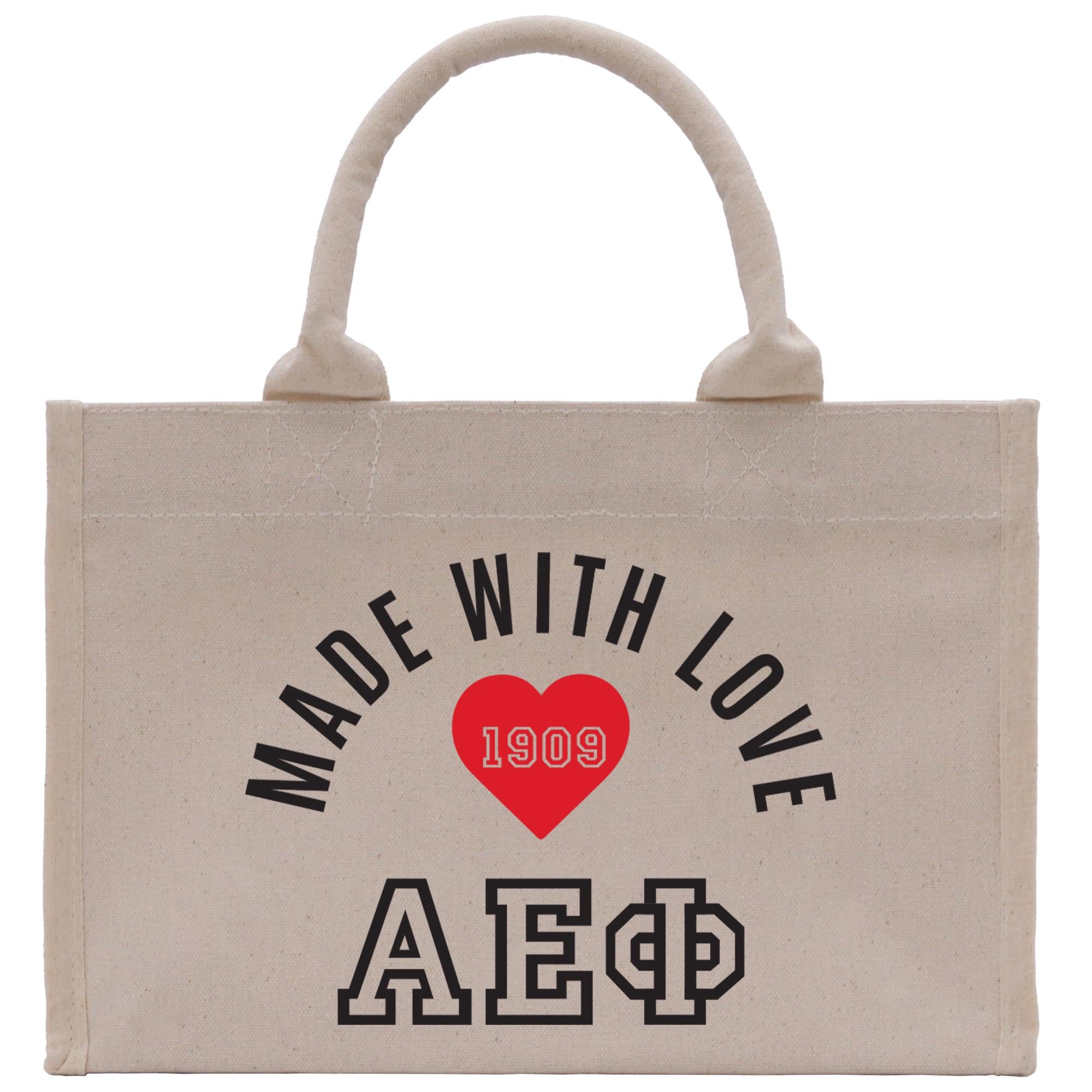 a bag with a heart and the words made with love