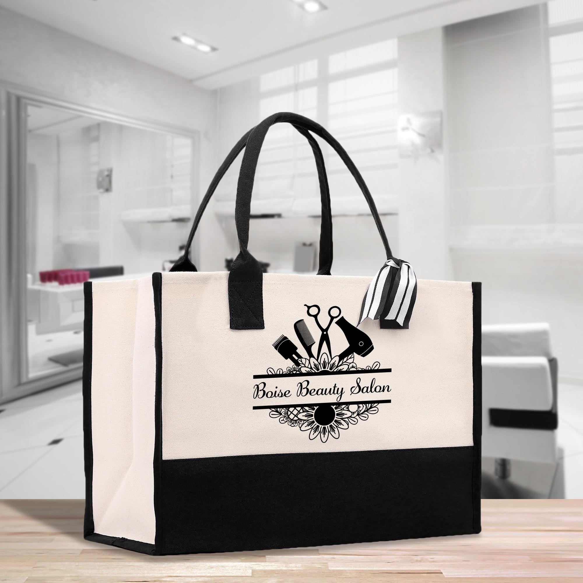 a black and white bag sitting on top of a wooden table