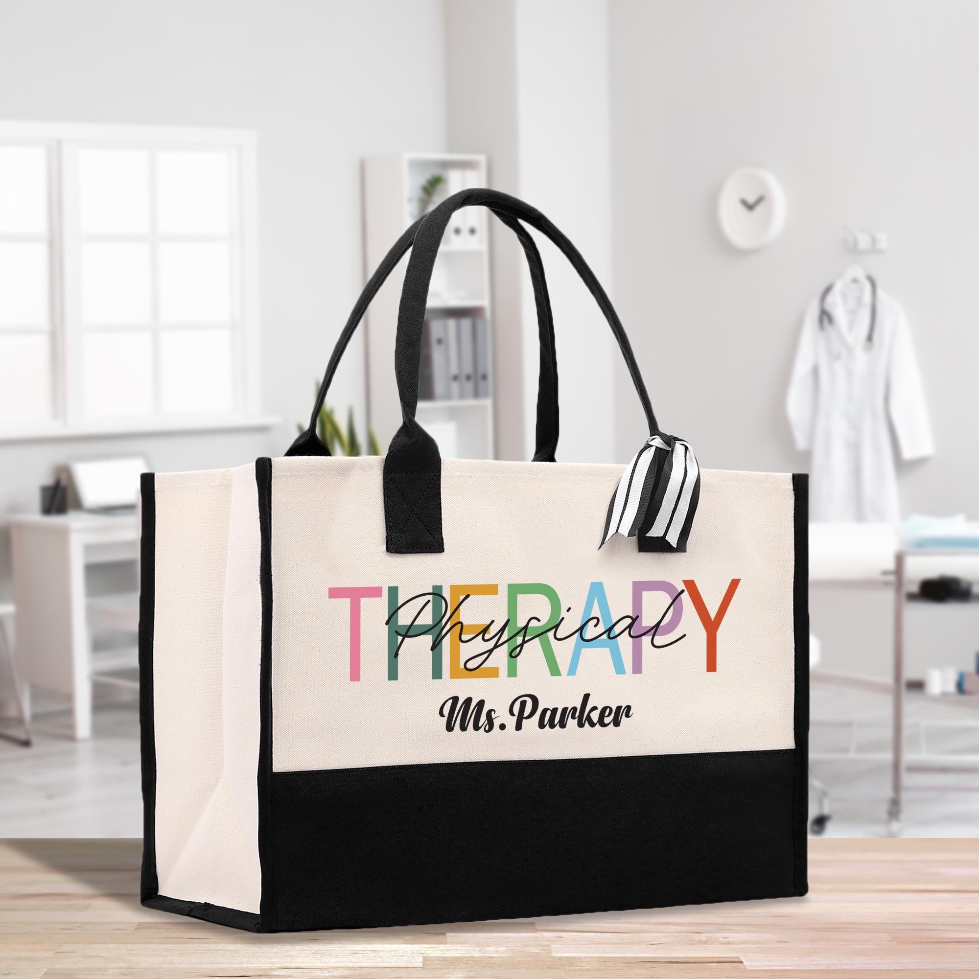 a black and white bag with the words therapy on it