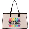 a canvas bag with crayons and the words miss magi on it