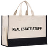 a white and black bag with the words real estate stuff on it