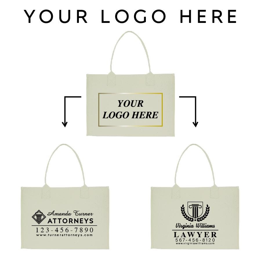 a white bag with a black and gold logo on it